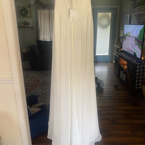 David's Bridal Dresses & Skirts - Ivory wedding gown with train. From David’s bridal